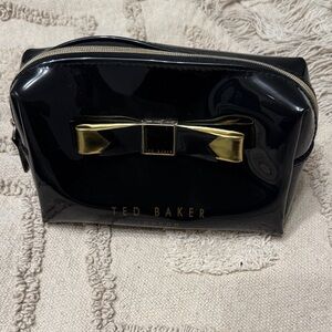 Ted Baker Glossy Black Bag with Gold Bow